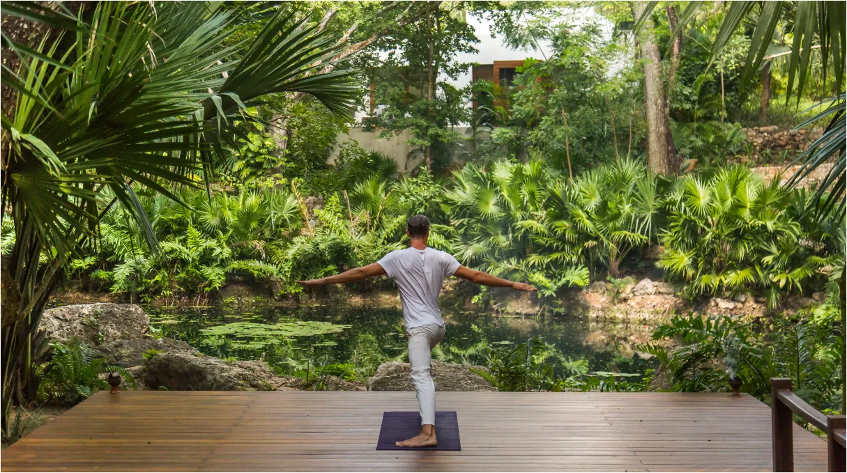 A wellness man enjoying a Yoga session